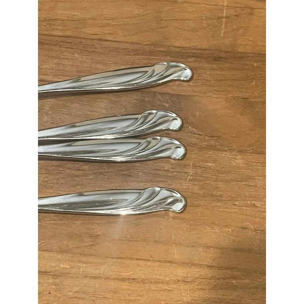 4 International Stainless steel Impression lunch forks